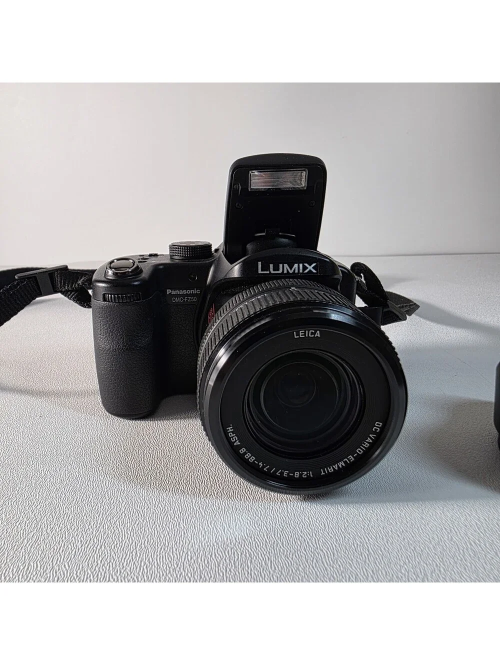 Panasonic LUMIX DMC-FZ50 10.1MP Digital Camera W/ Charger, Hood & Cords